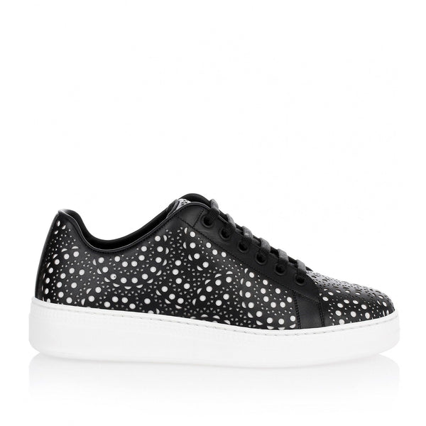 Black laser-cut sneaker