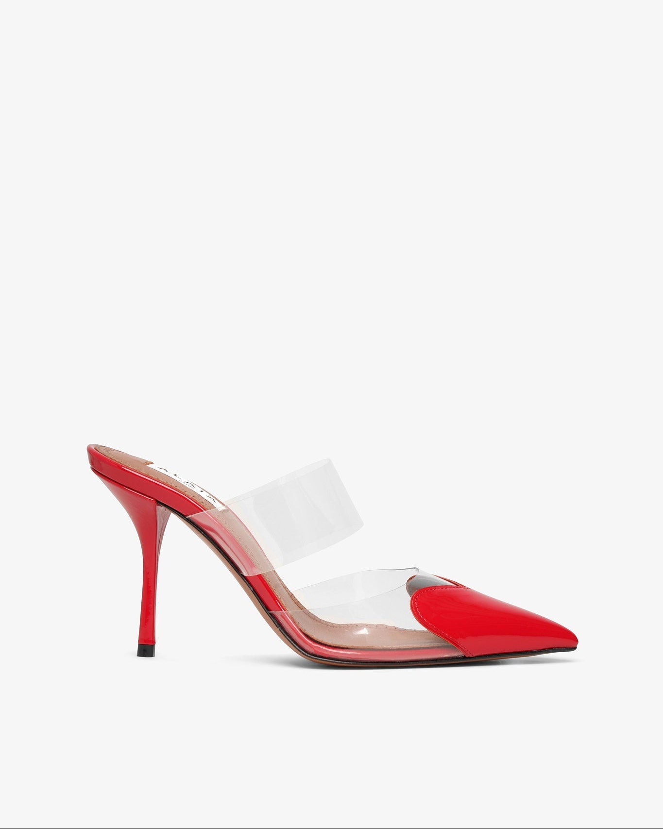 Red high-heeled shoe with clear strap on a white background