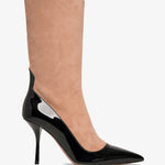 Tan knee-high boot with a black stiletto heel on a white background