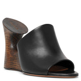 La Sculpture black leather wedge mules