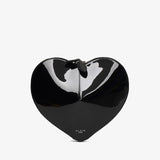 Black heart-shaped clutch bag on a white background