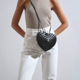 Le Coeur black perforated crossbody bag