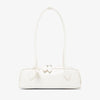 White handbag with a bow detail on a white background