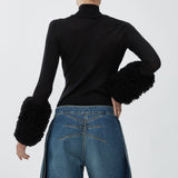 Faux fur sleeved knit top