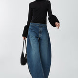 Faux fur sleeved knit top