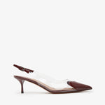 Brown sandal with a thin strap on a white background