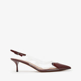 Brown sandal with a thin strap on a white background