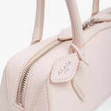 Le Teckel Small light pink bag
