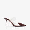 High-heeled shoe with clear strap on a white background