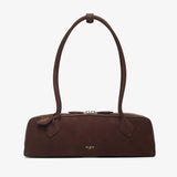 Brown handbag with a visible brand logo on a white background