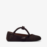 Brown flat shoe with a bow on a white background