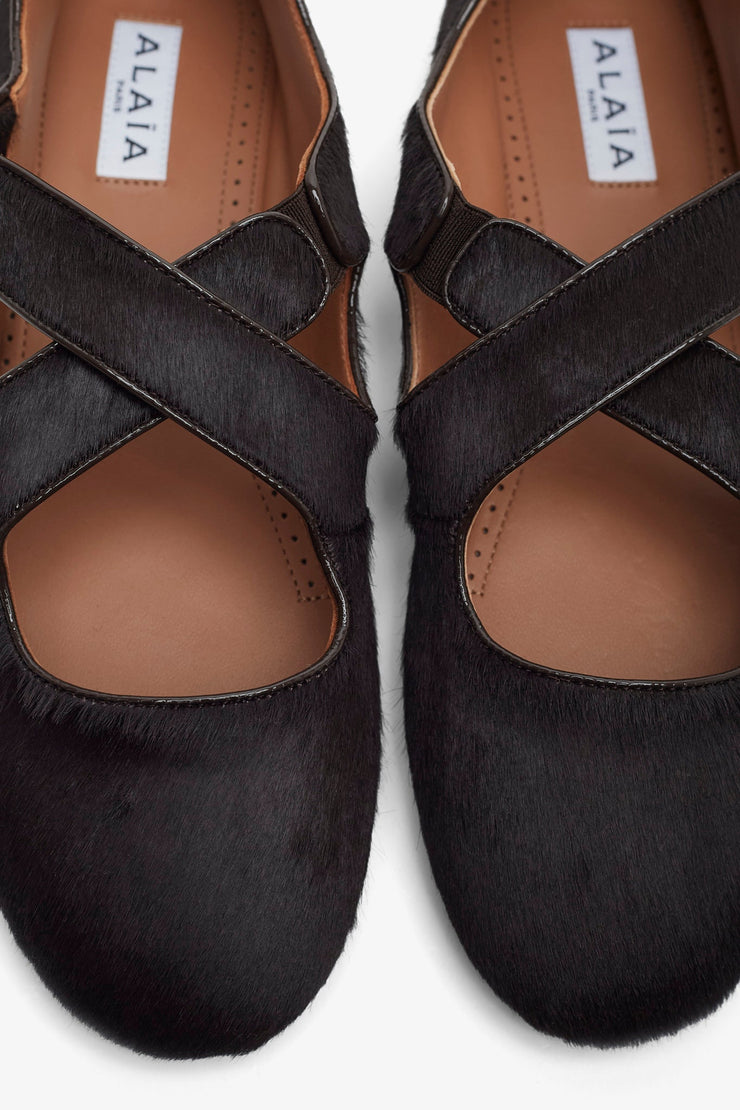 Criss cross brown ballet flats