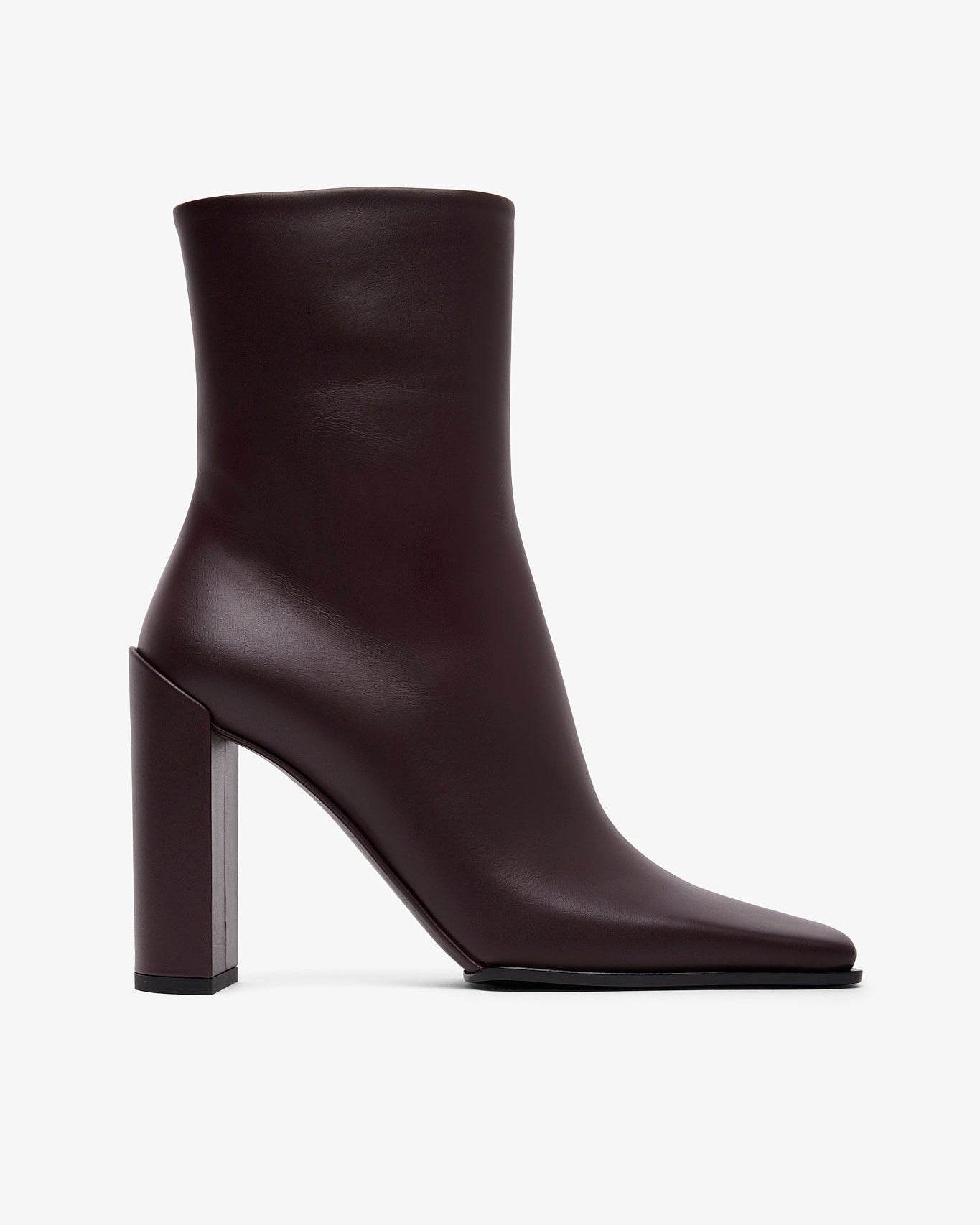 Brown ankle boot with a block heel on a white background