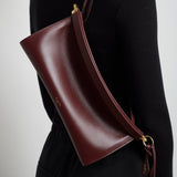 Le Click east west medium dark red bag