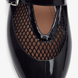 Black rubber ballet flats