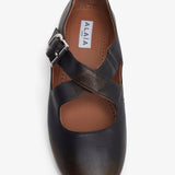 Criss cross brown ballet flats
