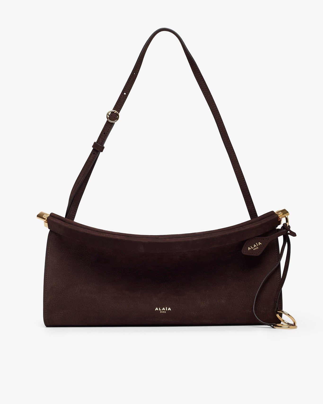 Brown leather handbag with a strap on a white background