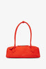 Le Teckel medium orange nubuck bag