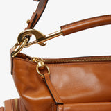 Shiny brown camera bag