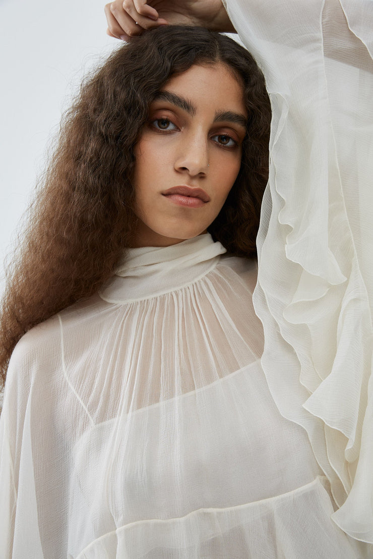 High-low white ruffle top in silk mousseline