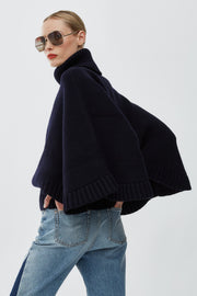 Short dark blue turtleneck cape