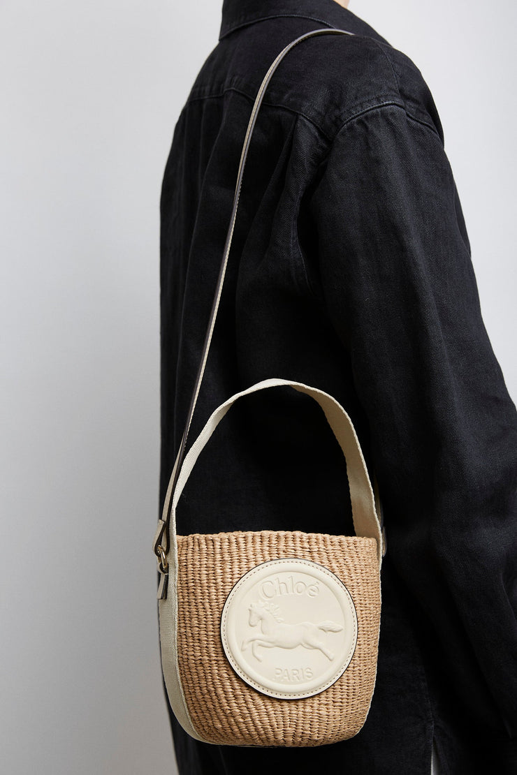 Horse medal ivory raffia bucket bag