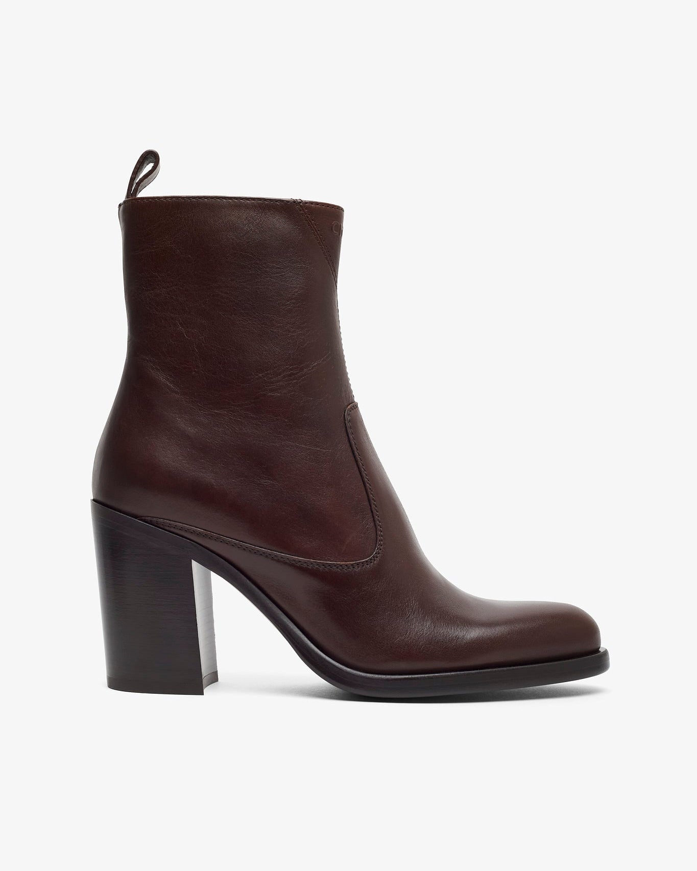 Brown leather ankle boot on a white background