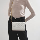 Paloma Loubinthesky white leather clutch