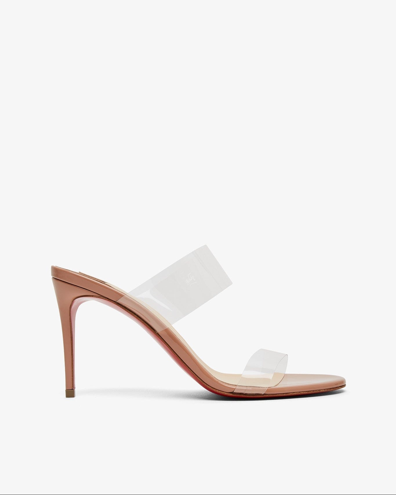 White high-heeled sandal with clear straps on a white background