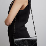 Loubi54 black glitter clutch
