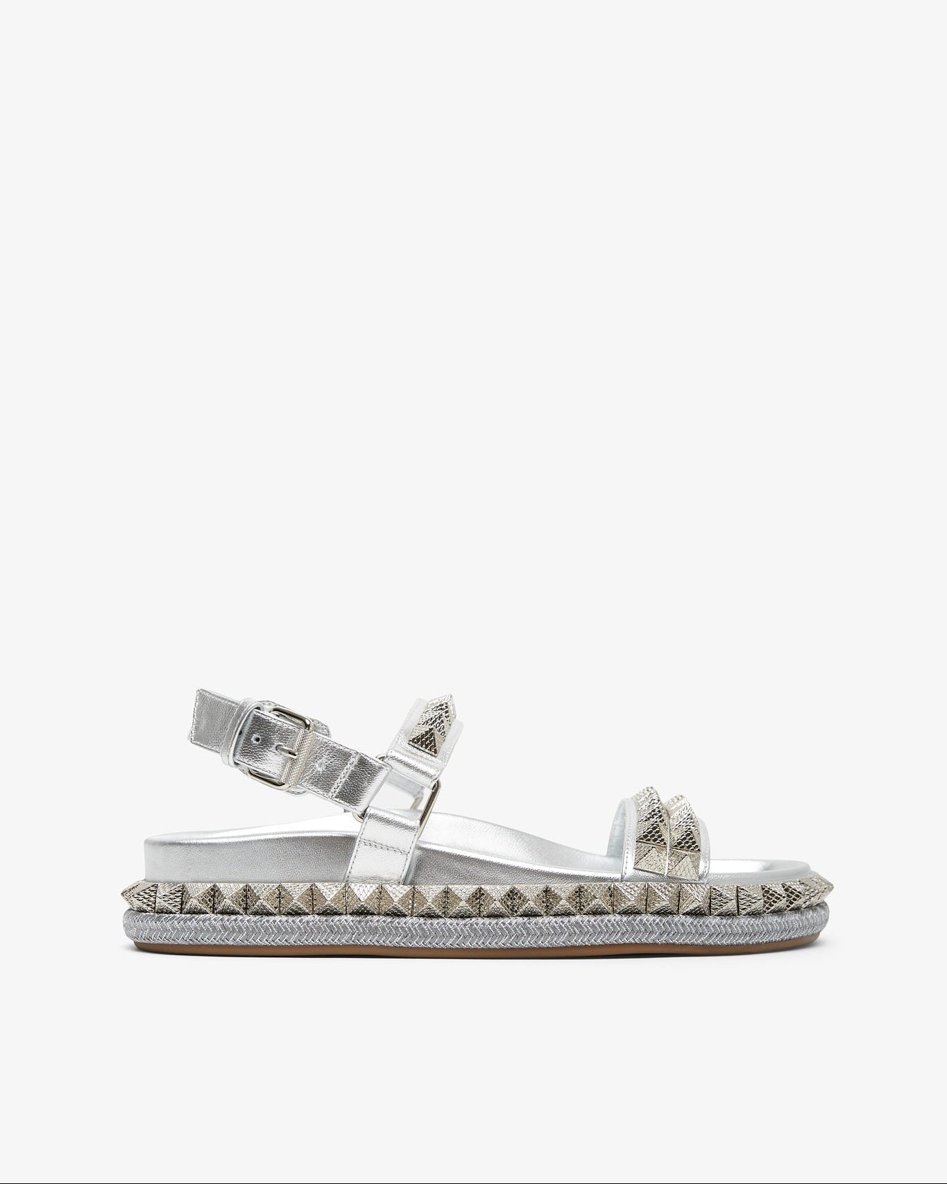 Silver studded sandal on a white background