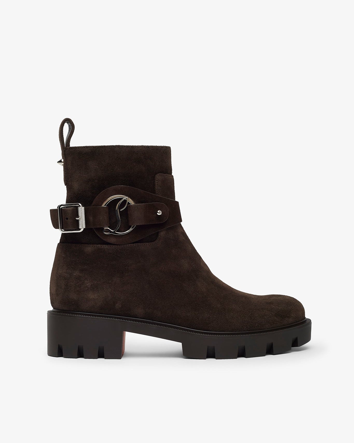 Brown suede boot with a buckle on a white background