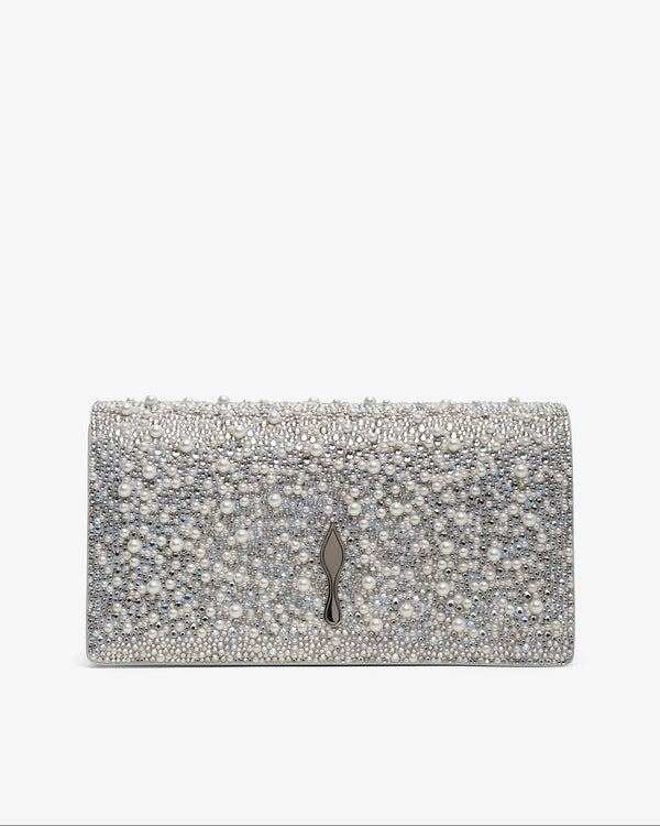 Silver clutch bag with decorative elements on a white background