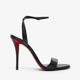 Black high-heeled sandal with red interior on a white background