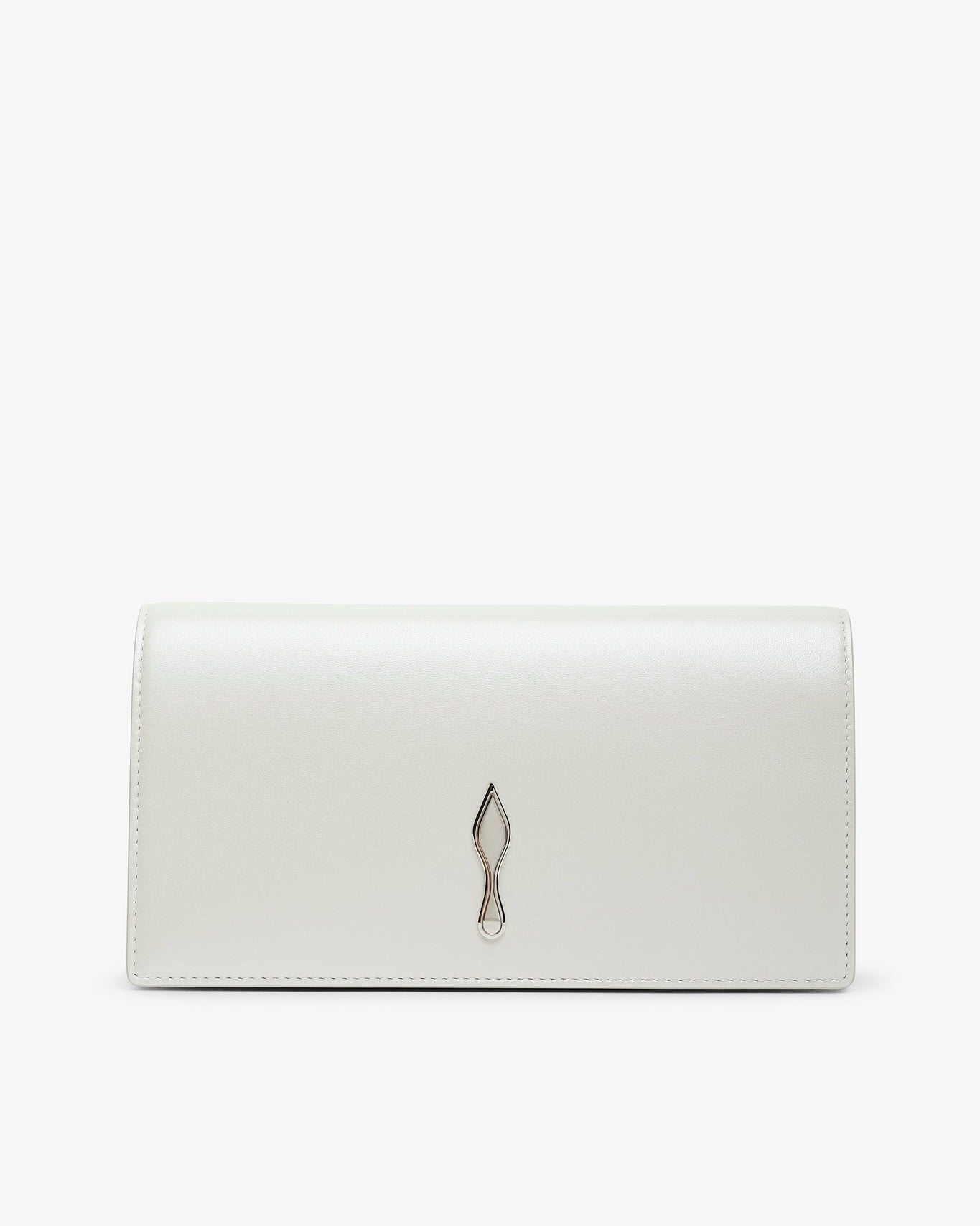 Pointed-toe shoe with beige leather sole and black heel on a white background