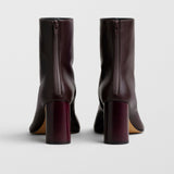 Tug oxblood leather ankle boots