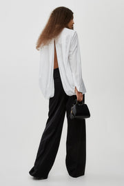 Oversized white shirt in poplin with open back