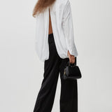 Oversized white shirt in poplin with open back