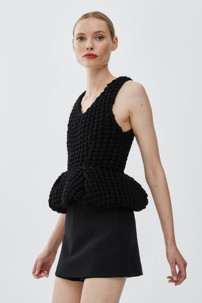 Slim fit peplum black top in waffle wool