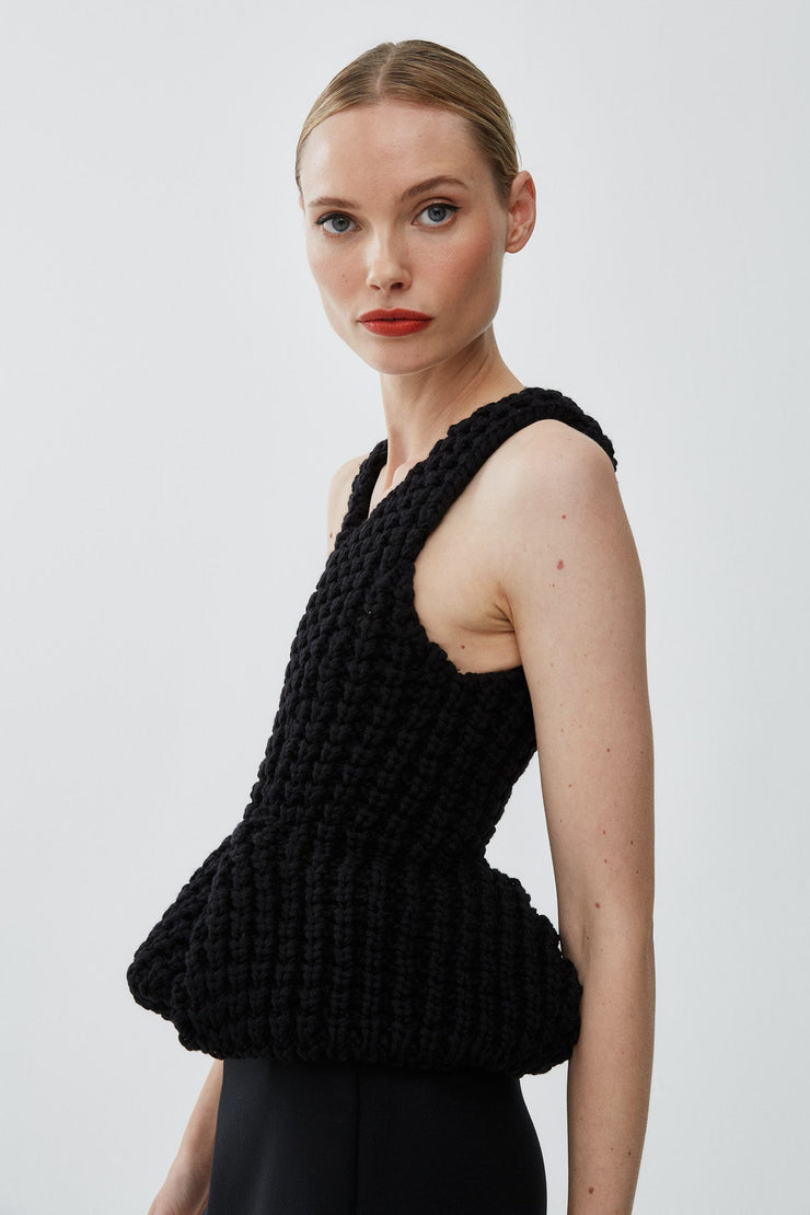 Slim fit peplum black top in waffle wool