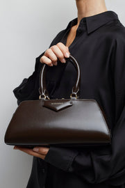 Antigona east west small brown bag