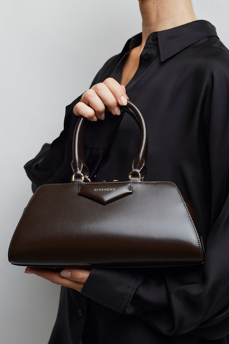 Antigona east west small brown bag