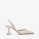 White high-heeled shoe with a minimalist design on a white background