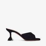Black high-heeled shoe on a white background