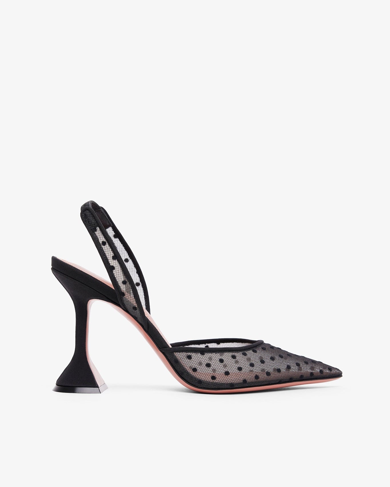 Black high-heeled shoe with a slingback design on a white background