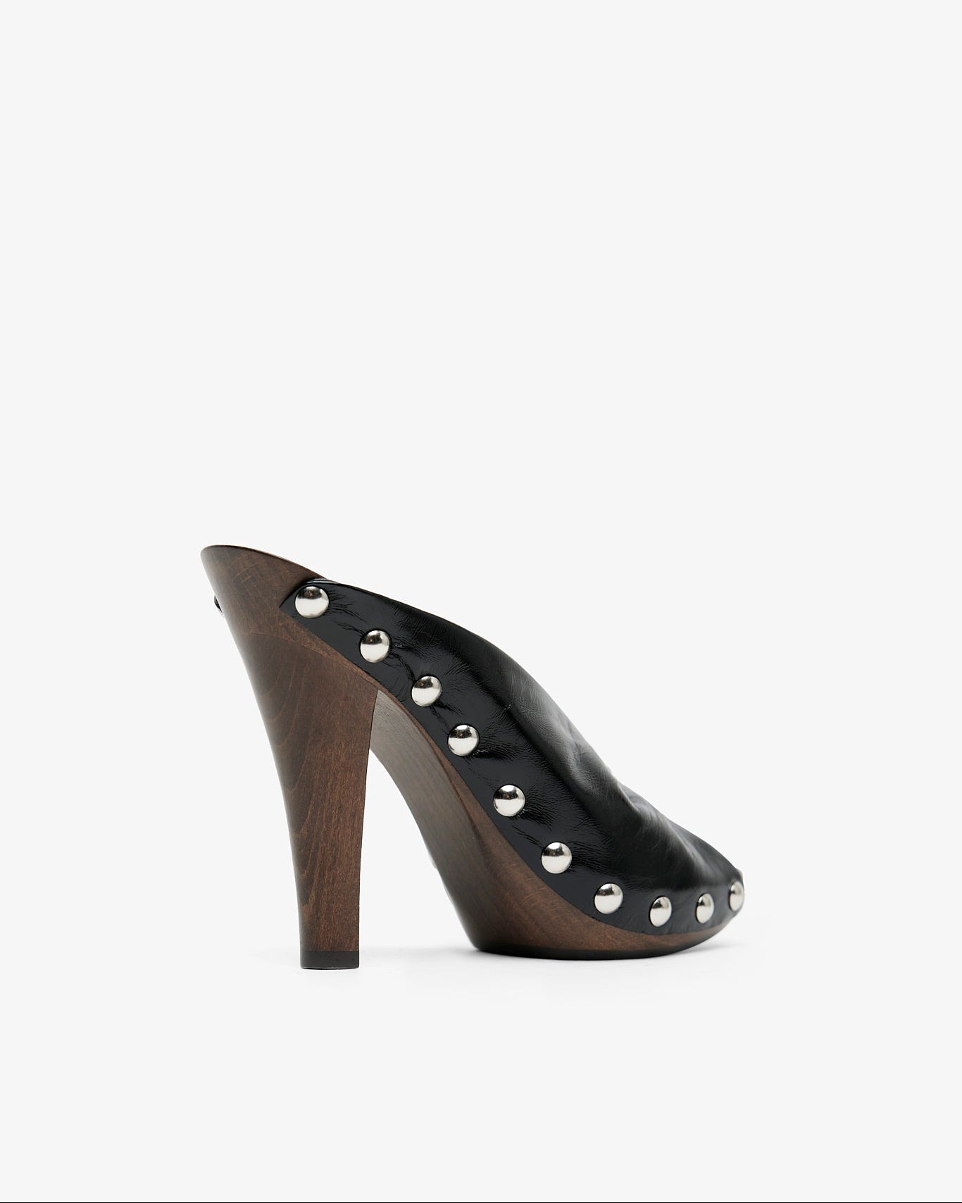 Black high-heeled shoe with studded details on a white background