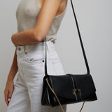 Front flap black crossbody bag