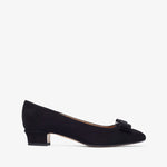 Black shoe with a bow on a white background