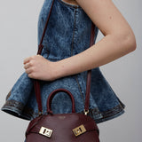 Hug mini soft plum top handle bag