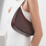 Half Moon bourbon leather shoulder bag